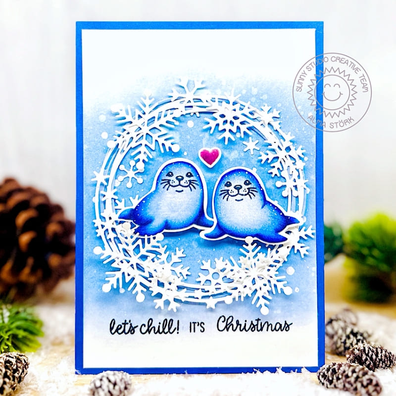 Sunny Studio Blue Seals & Swirling Snowflakes Circle Frame Winter Holiday Christmas Card using Let's Chill Clear Craft Stamps